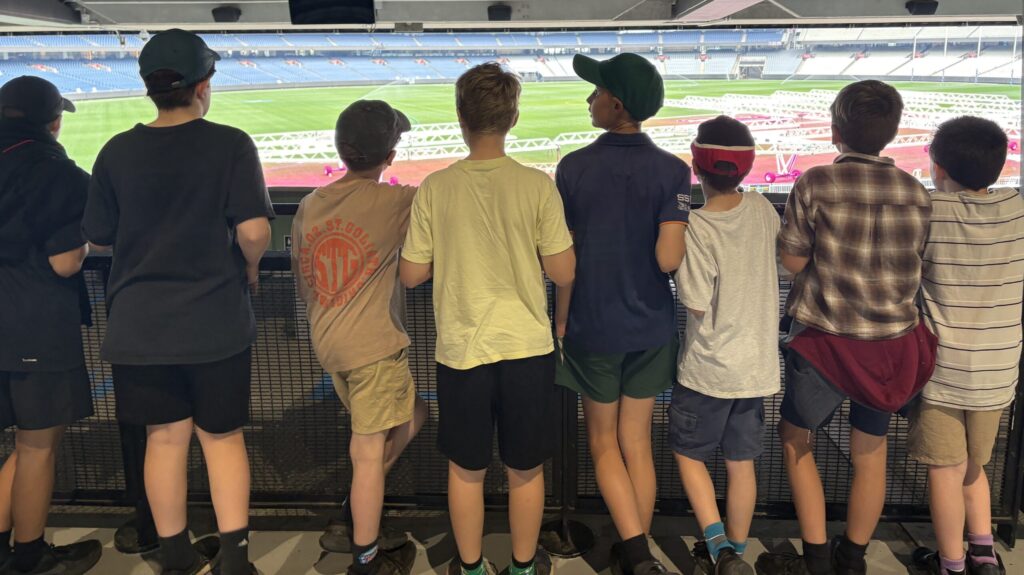 Trentham Primary School students looking out over a sports stadium during City Camp.